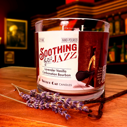 Candle decorated with dried lavender and vanilla beans next to it with a speakeasy bar background