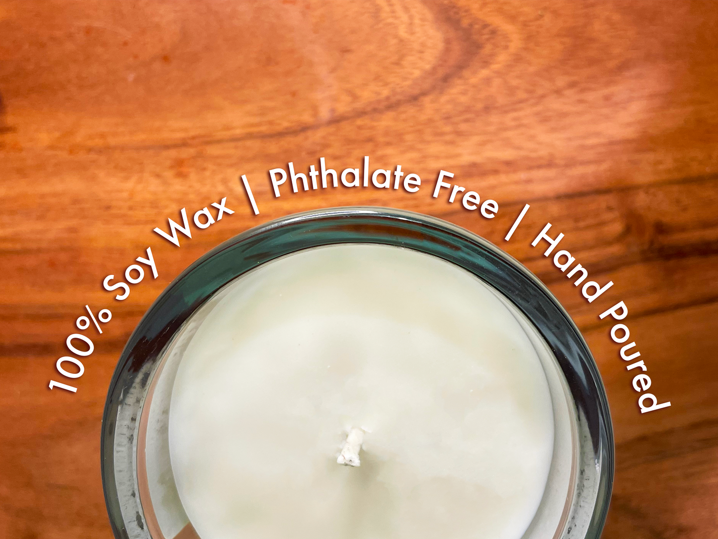 top view of a candle with the facts 100 percent soy wax, phthalate free, hand poured